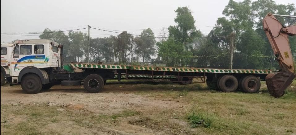 Low-bed trailer used to move construction equipment